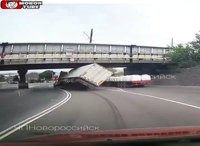 Video :Truck flips over when driver takes a turn too fast